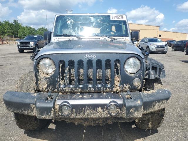 Photo 5 from auction – 2016 JEEP WRANGLER U with VIN 1C4BJWDG4GL105293