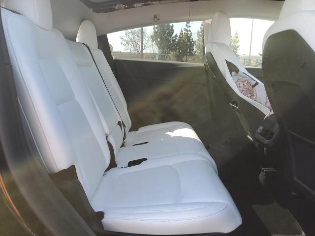 Photo 11 from auction – 2023 TESLA MODEL Y with VIN 7SAYGAEE0PF968185