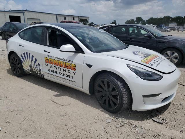 Photo 4 from auction – 2021 TESLA MODEL 3 with VIN 5YJ3E1EB1MF087025