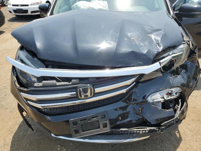 Photo 12 from auction – 2017 HONDA PILOT TOUR with VIN 5FNYF6H92HB104607