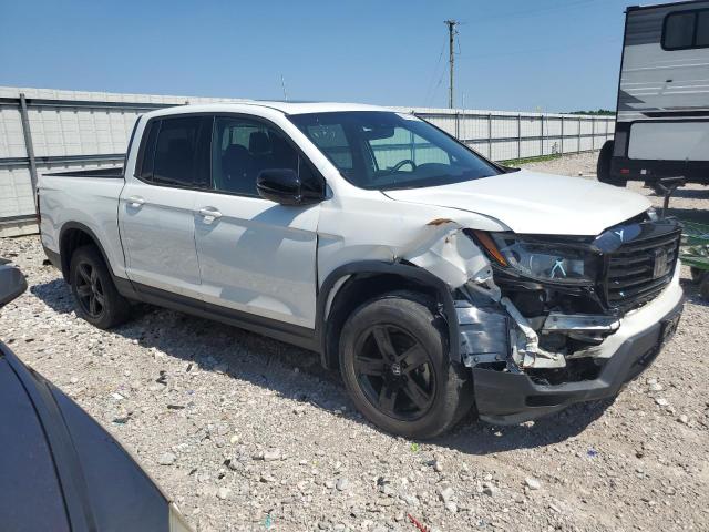 Photo 4 from auction – 2022 HONDA RIDGELINE with VIN 5FPYK3F85NB010826