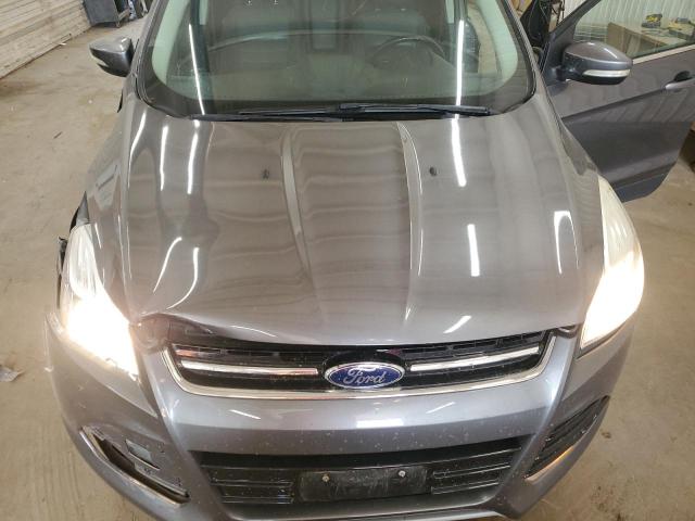 Photo 11 from auction – 2014 FORD ESCAPE TIT with VIN 1FMCU9J99EUA62866