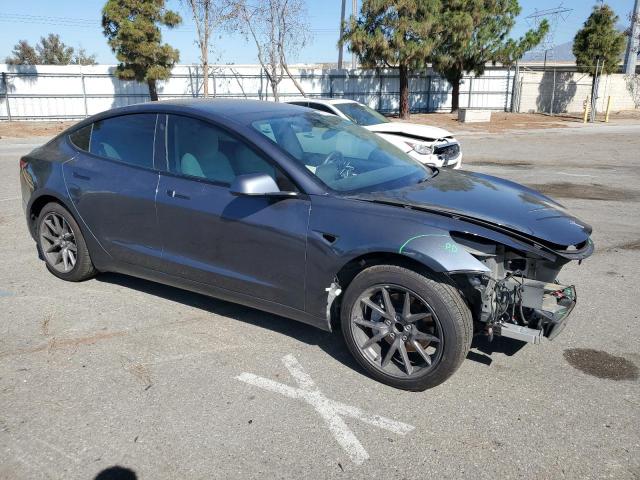 Photo 4 from auction – 2021 TESLA MODEL 3 with VIN 5YJ3E1EA7MF929535