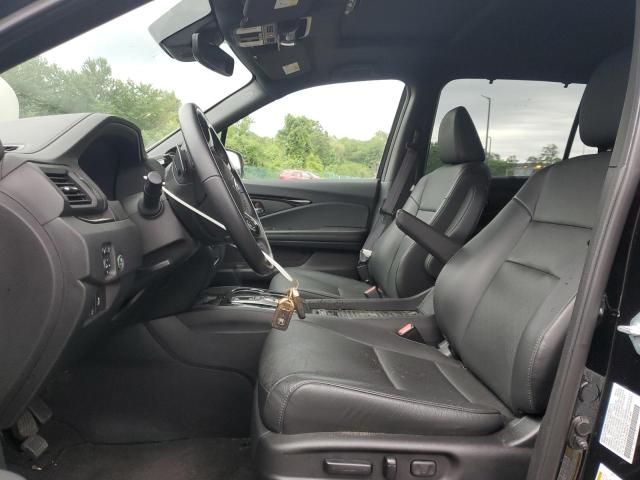 Photo 7 from auction – 2021 HONDA PASSPORT TOURING with VIN 5FNYF8H91MB036614