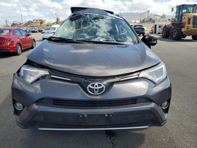 Photo 5 from auction – 2016 TOYOTA RAV4 XLE with VIN JTMWFREV7GJ093914