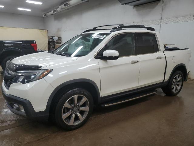 HONDA RIDGELINE 2018 with VIN 5FPYK3F74JB001049 - Photo from auction
