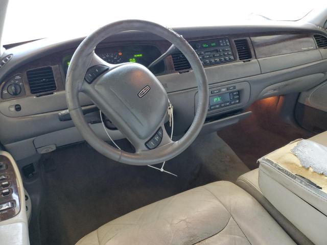 Photo 8 from auction – 1999 LINCOLN TOWN CAR E with VIN 1LNHM81W2XY658371