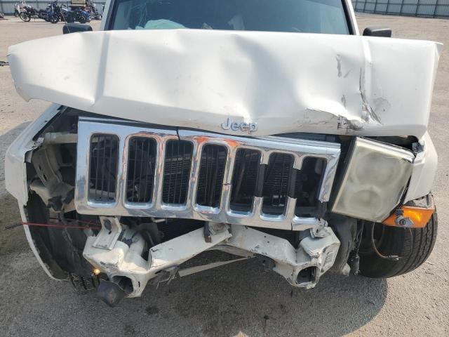 Photo 12 from auction – 2010 JEEP COMMANDER with VIN 1J4RH4GK4AC113720