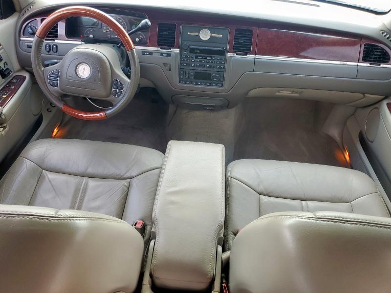 Photo 8 from auction – 2004 LINCOLN TOWN CAR U with VIN 1LNHM83W24Y660405