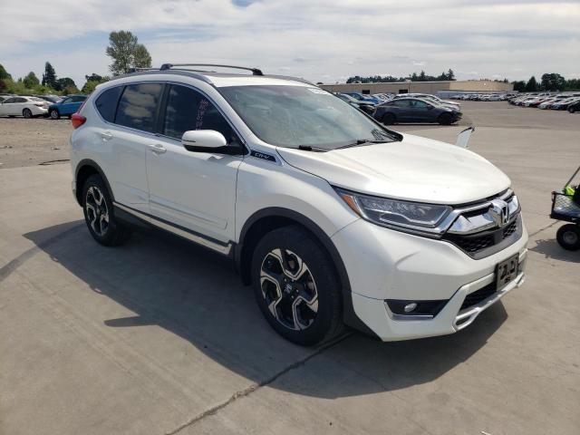 Photo 4 from auction – 2018 HONDA CR-V TOURI with VIN 2HKRW2H96JH644658