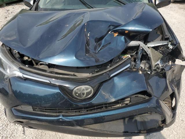 Photo 12 from auction – 2018 TOYOTA RAV4 LE with VIN JTMBFREV7JJ253067