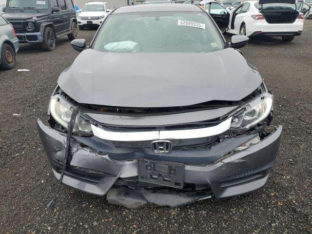 Photo 11 from auction – 2018 HONDA CIVIC LX with VIN 2HGFC2F56JH560202