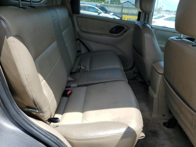 Photo 11 from auction – 2003 FORD ESCAPE LIM with VIN 1FMCU94143KC35157