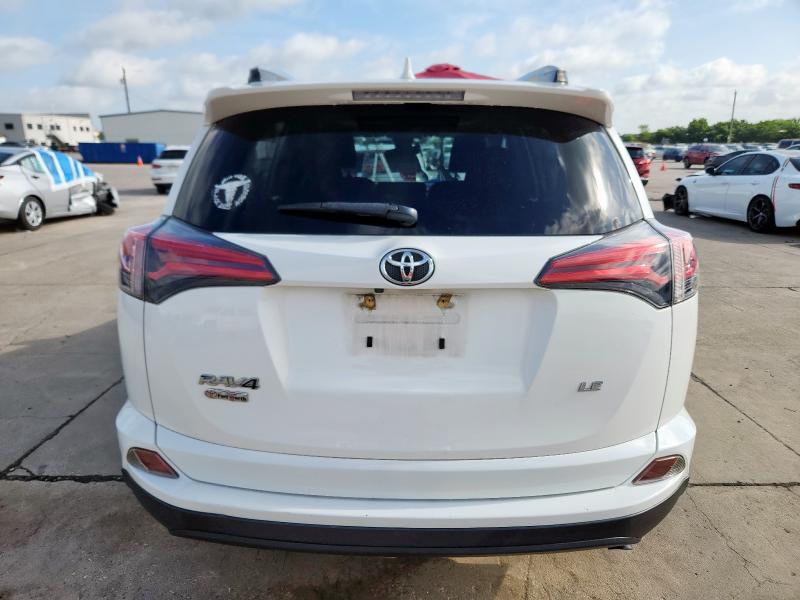 Photo 6 from auction – 2018 TOYOTA RAV4 LE with VIN JTMZFREV0JJ740772
