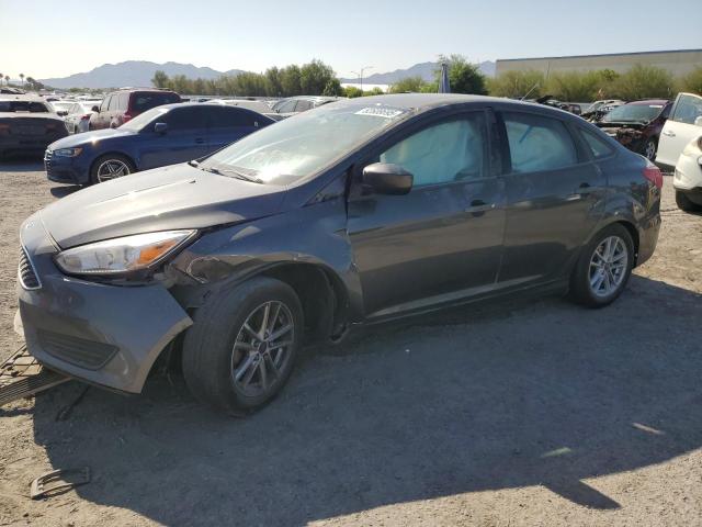 FORD FOCUS SE 2018 with VIN 1FADP3FE5JL304092 - Photo from auction