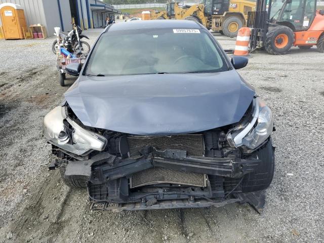 Photo 5 from auction – 2014 KIA FORTE LX with VIN KNAFK4A61E5061718