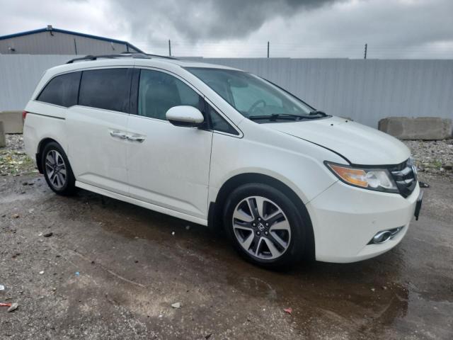 Photo 4 from auction – 2014 HONDA ODYSSEY TO with VIN 5FNRL5H95EB083772