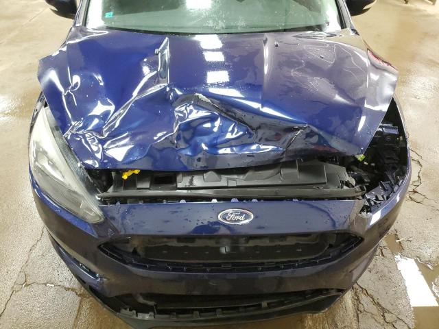Photo 11 from auction – 2016 FORD FOCUS SE with VIN 1FADP3F29GL359594
