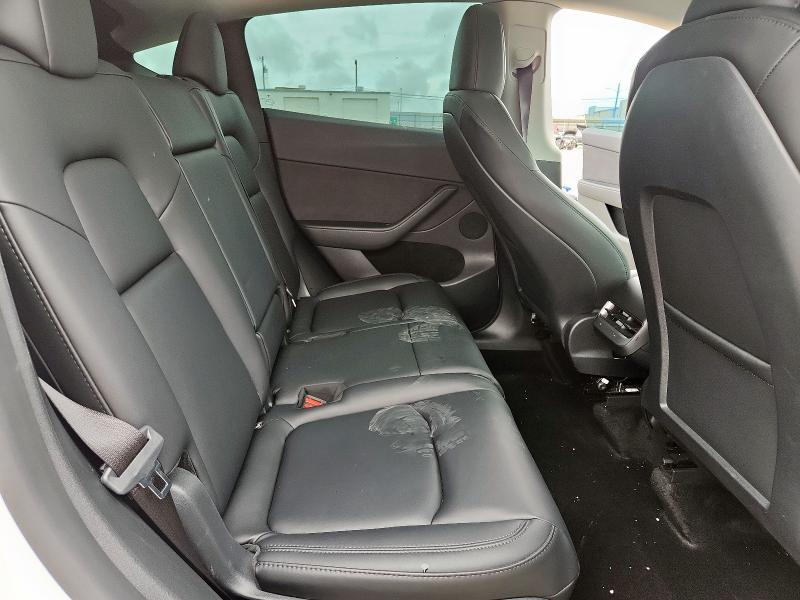 Photo 10 from auction – 2023 TESLA MODEL Y with VIN 7SAYGAEE6PF802463