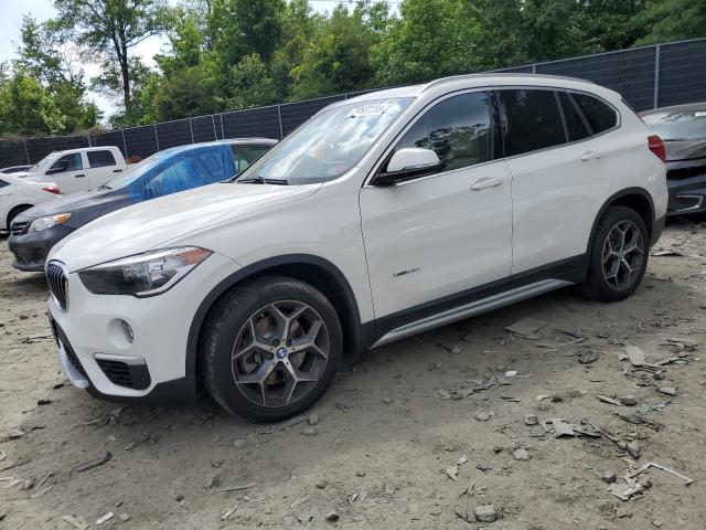 BMW X1 XDRIVE2 2018 with VIN WBXHT3C36J5K23992 - Photo from auction