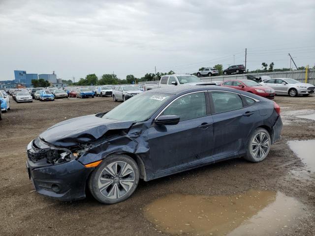 HONDA CIVIC EX 2017 with VIN 19XFC1F34HE005701 - Photo from auction