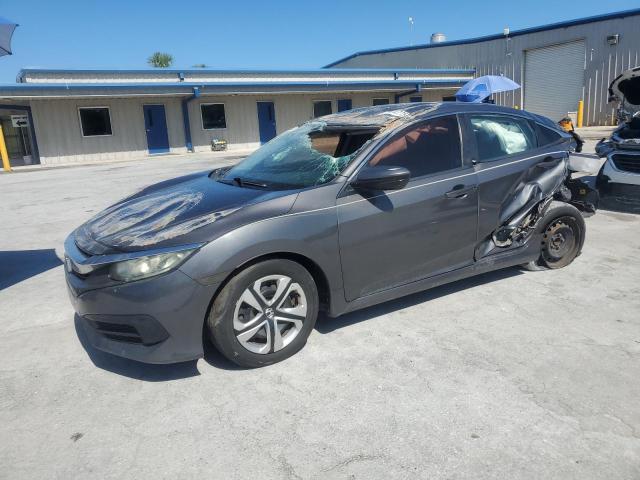 HONDA CIVIC LX 2016 with VIN 19XFC2F59GE034231 - Photo from auction