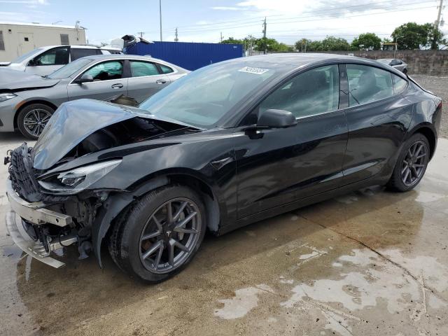 TESLA MODEL 3 2022 with VIN 5YJ3E1EAXNF288429 - Photo from auction