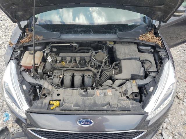 Фото 11 с аукциона – 2015 FORD FOCUS SE с VIN 1FADP3K21FL375048