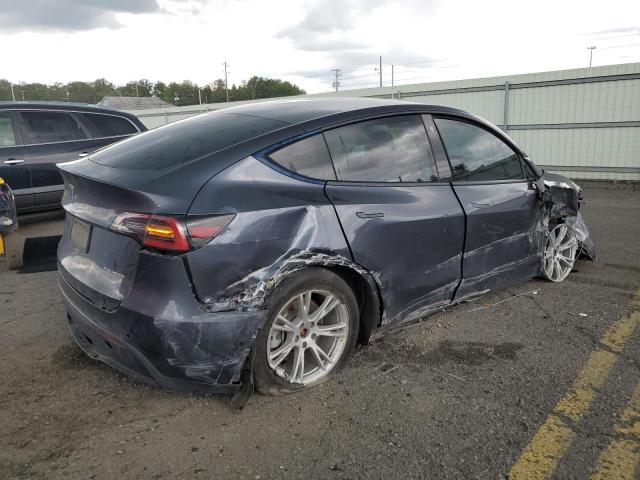 Photo 3 from auction – 2022 TESLA MODEL Y with VIN 7SAYGDEE6NF310613