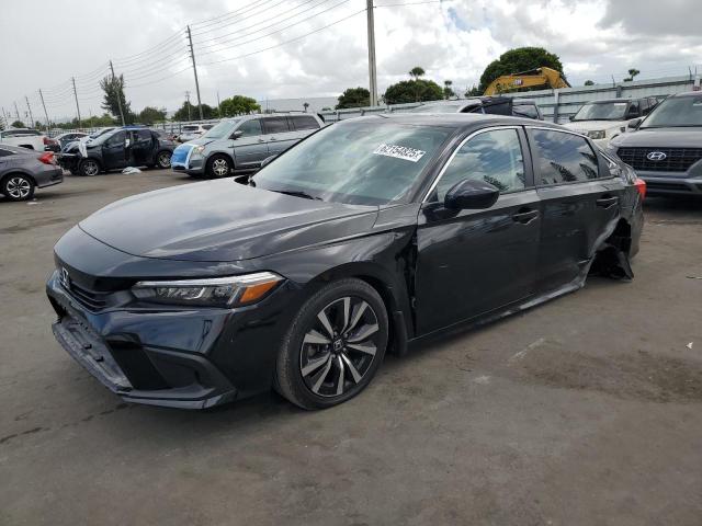HONDA CIVIC EX 2023 with VIN 2HGFE1F70PH313658 - Photo from auction