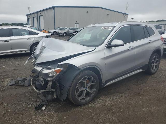 BMW X1 2010 with VIN WBXHT3C39J5L27554 - Photo from auction
