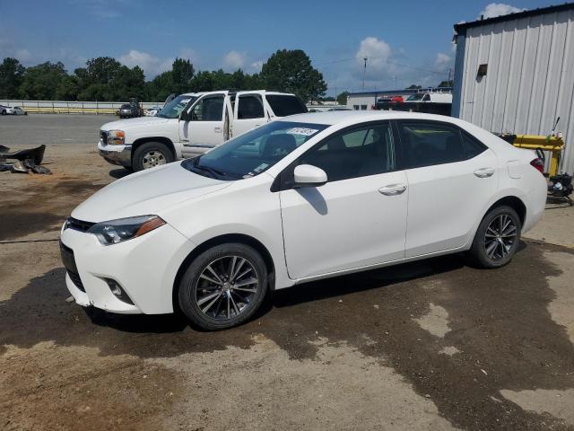 TOYOTA COROLLA L 2016 with VIN 5YFBURHE1GP557811 - Photo from auction