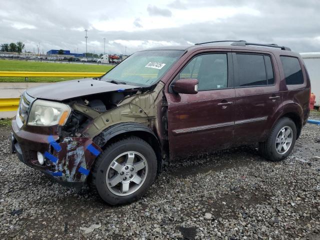HONDA PILOT TOUR 2011 with VIN 5FNYF3H94BB039121 - Photo from auction