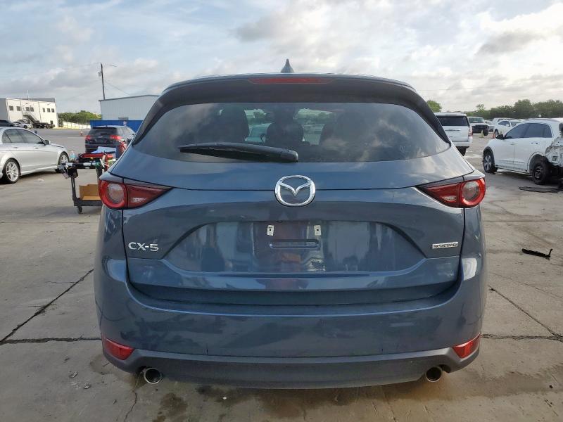 Photo 6 from auction – 2021 MAZDA CX-5 TOURI with VIN JM3KFACM3M0385823