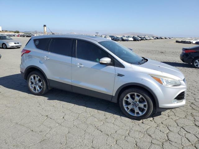 Photo 4 from auction – 2013 FORD ESCAPE SEL with VIN 1FMCU9H97DUD80585