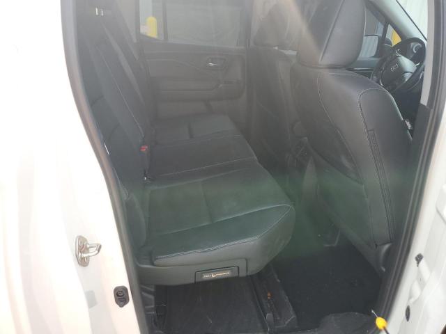 Photo 10 from auction – 2019 HONDA RIDGELINE with VIN 5FPYK3F79KB000299