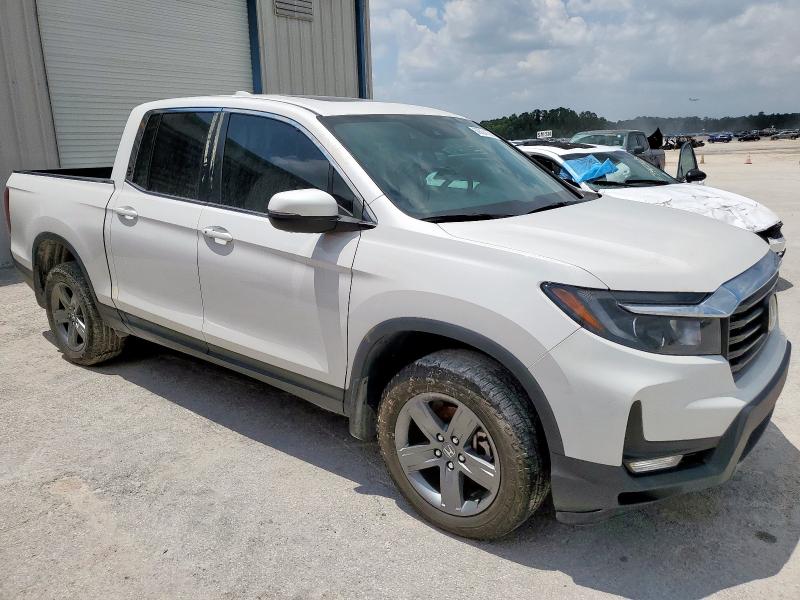 Photo 4 from auction – 2023 HONDA RIDGELINE with VIN 5FPYK3F51PB038793