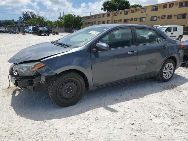 TOYOTA COROLLA L 2018 with VIN 5YFBURHE3JP754311 - Photo from auction
