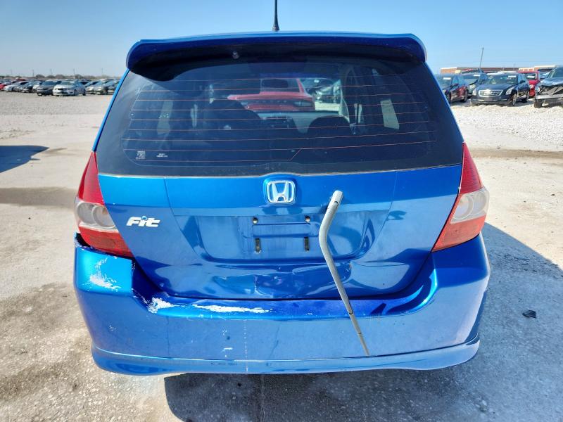 Photo 6 from auction – 2007 HONDA FIT with VIN JHMGD38677S001561