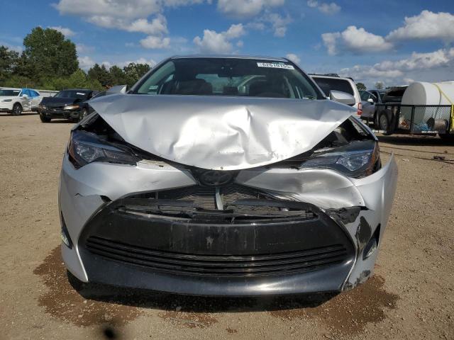 Photo 5 from auction – 2017 TOYOTA COROLLA L with VIN 2T1BURHEXHC771861
