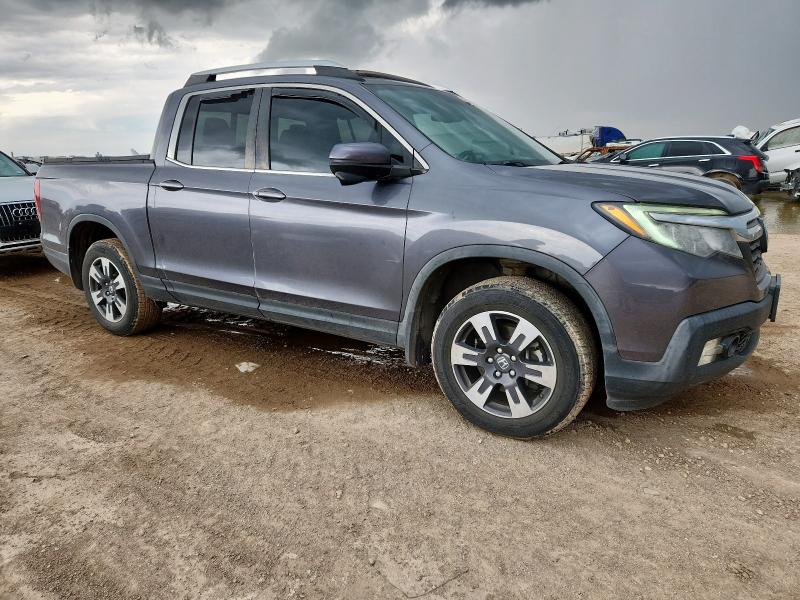 Photo 4 from auction – 2019 HONDA RIDGELINE with VIN 5FPYK3F66KB008609