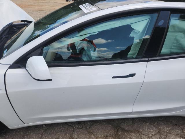Photo 7 from auction – 2023 TESLA MODEL 3 with VIN 5YJ3E1EA8PF408067