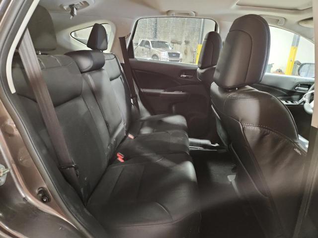Photo 11 from auction – 2015 HONDA CR-V EX with VIN 2HKRM4H59FH650217