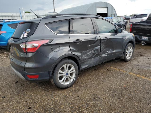 Photo 3 from auction – 2018 FORD ESCAPE SE with VIN 1FMCU9GD7JUA32772