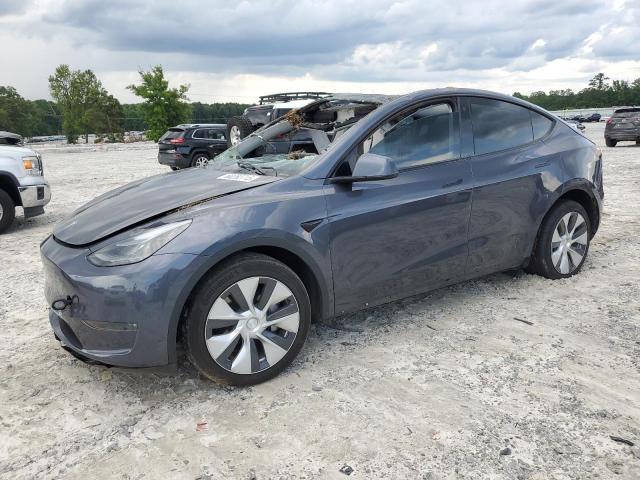 TESLA MODEL Y 2023 with VIN 7SAYGDEE4PF608211 - Photo from auction