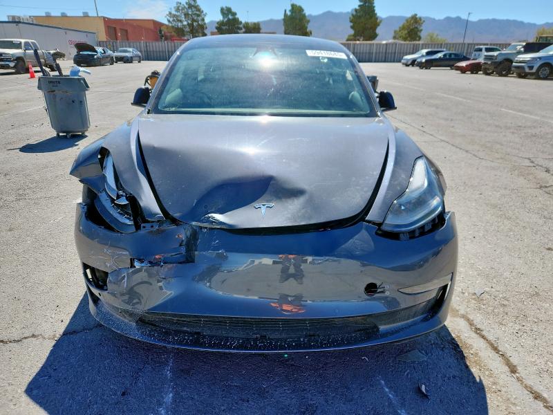 Photo 5 from auction – 2022 TESLA MODEL 3 with VIN 5YJ3E1EC3NF144870