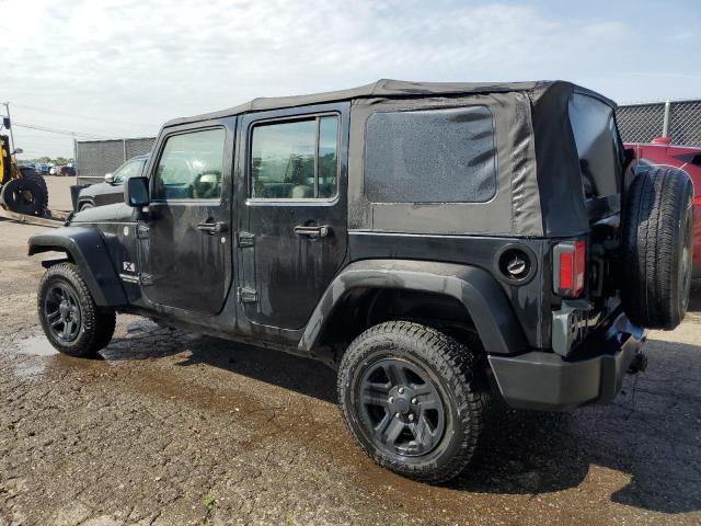 Photo 2 from auction – 2009 JEEP WRANGLER U with VIN 1J4GA39179L759095