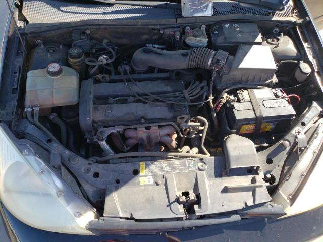 Photo 11 from auction – 2000 FORD FOCUS with VIN 1FAFP3836YW109146