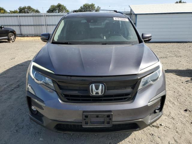 Photo 5 from auction – 2021 HONDA PILOT SE with VIN 5FNYF6H20MB096116