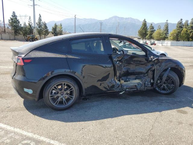 Photo 3 from auction – 2025 TESLA MODEL Y with VIN 7SAYGDED5SF279616